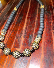 Load image into Gallery viewer, Royal Black and Gold Neck Ornament